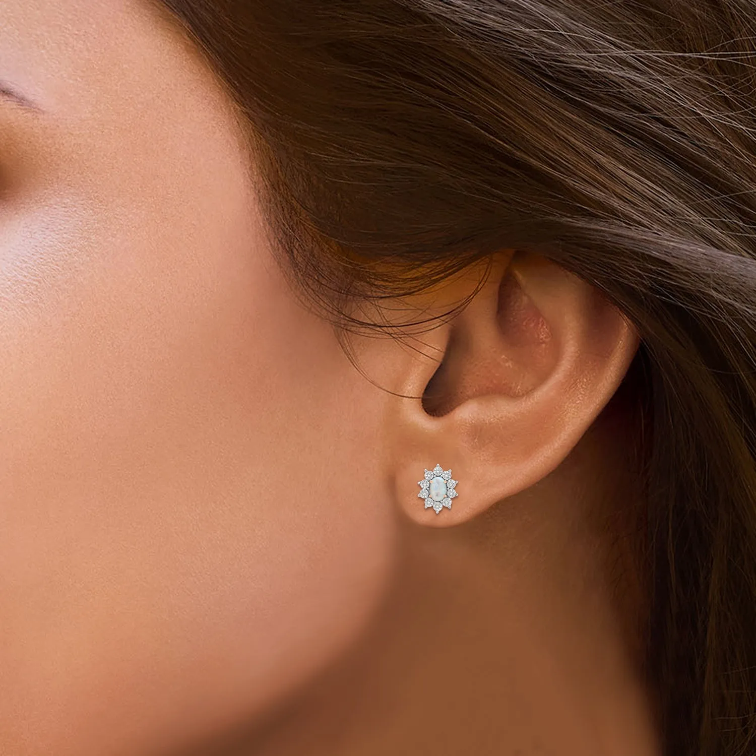 Jewelili 14K Rose Gold over Sterling Silver Oval Cut Created Opal and Natural White Round Diamond Accent Halo Stud Earrings