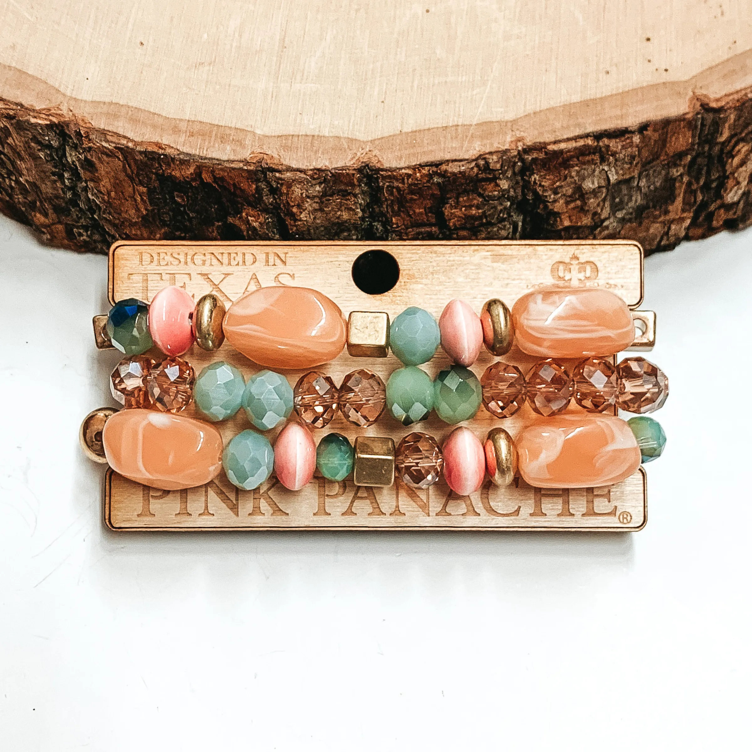 Pink Panache | Three Strand Peach and Multicolor Beaded Bracelet Set with Gold Beaded Spacers